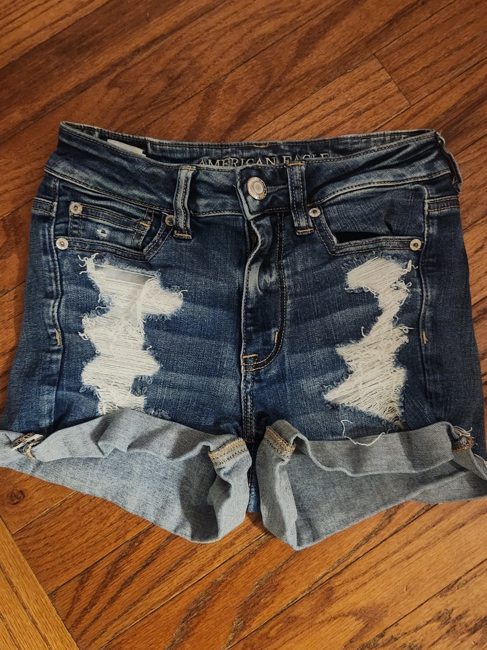 American Eagle Outfitters Distressed Dark Blue Rolled Cuff Jean Shorts